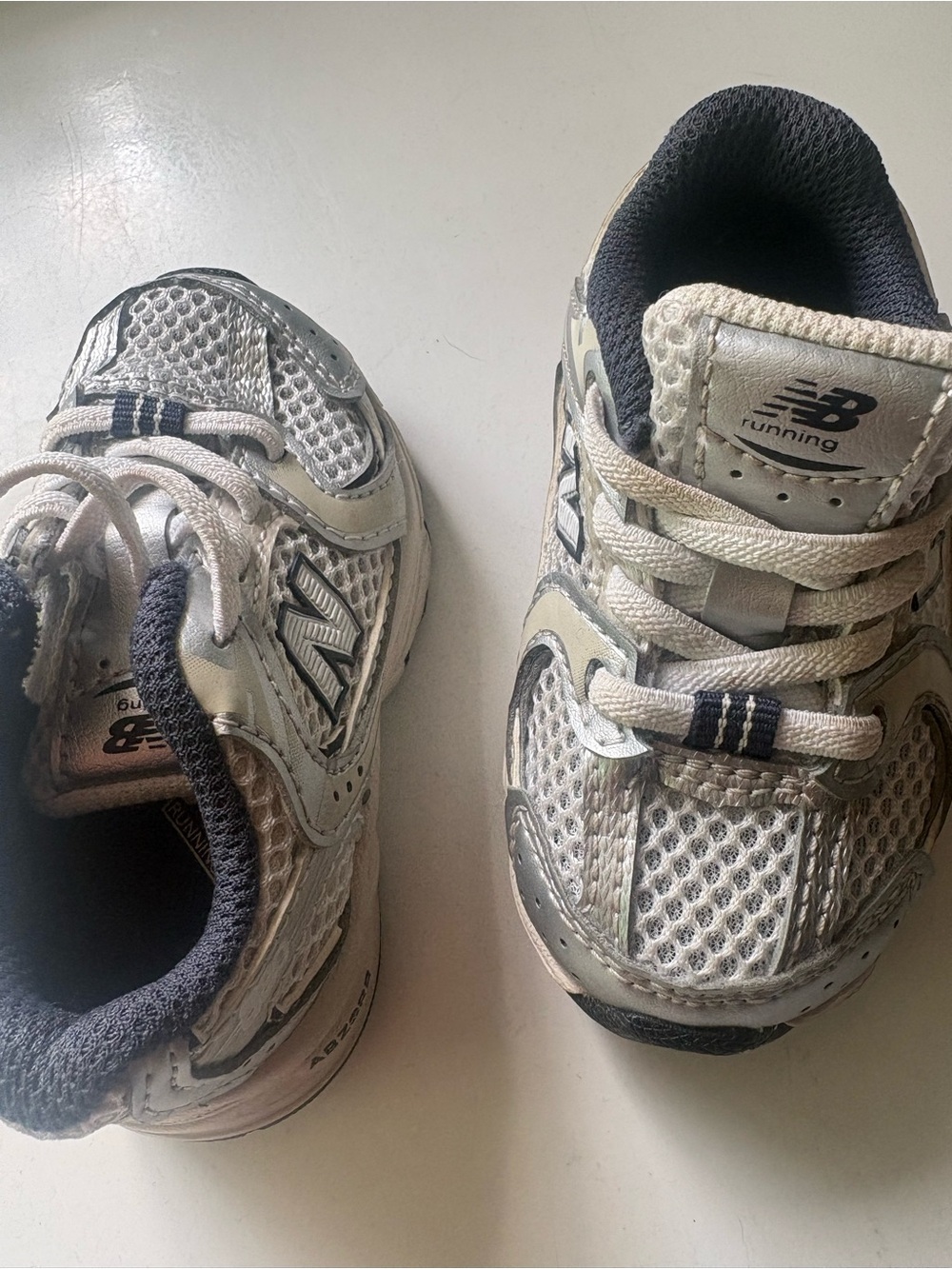 New Balance Kids White and Gray Athletic Sneakers